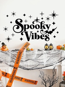 Detail of Spooky Vibes Halloween wall decal with stars and bat on a decorated fireplace