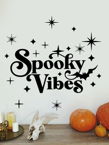 Detail showing Spooky Vibes wall sticker with bats and stars in a Halloween home setting