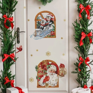 Christmas window wall stickers featuring Santa Claus and penguins on a white room door