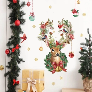 Christmas reindeer wall decal set with floral antlers and festive hanging ornaments