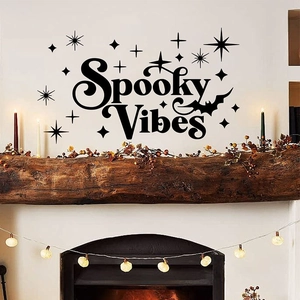 Halloween Spooky Vibes wall decal with stars and bats over a cozy fireplace decor