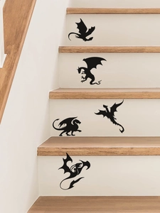 Detail von 5 schwarzen Drachen-Wandstickern an einer weißen Treppenhauswand angebracht