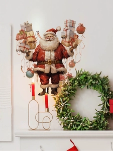 Detail of Santa Claus wall decal holding gift boxes for Christmas home decoration