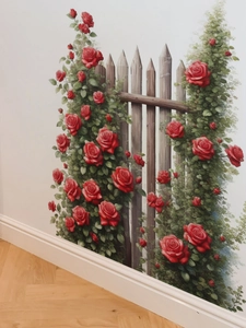 Detail view of red rose flower wall stickers with garden fence on a white wall