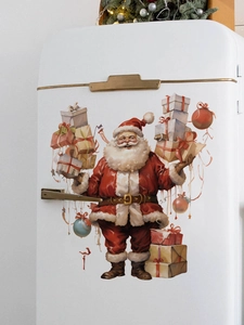 Detail of festive Santa Claus wall sticker with gift boxes on white refrigerator background