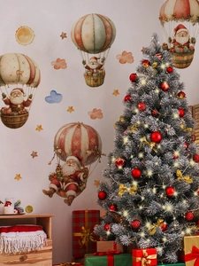 Détail des stickers muraux Père Noël en montgolfière pour une ambiance de fête