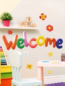 Colorful 3D balloon style Welcome wall stickers and floral decals in a kids playroom decor