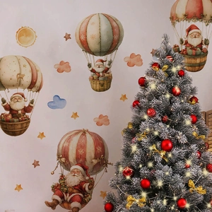 Sticker mural de Noël avec Père Noël en montgolfière et étoiles pour décoration murale