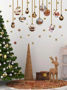 Detail of Christmas wall stickers showing colorful crystal ball decals and gold stars