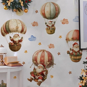 Sticker mural Père Noël en montgolfière pour décoration festive du salon et de la chambre