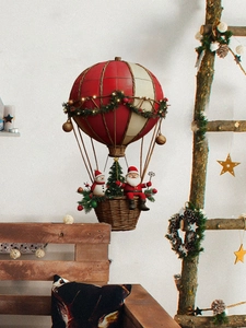 Detail of a Christmas Santa hot air balloon decoration with red and white stripes