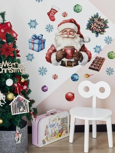 Detail von Weihnachts-Weihnachtsmann-Wandtattoos auf einer rosa und weißen Wand