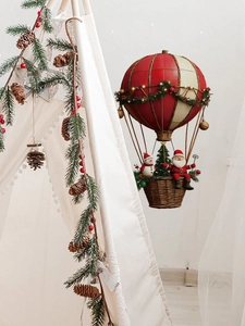 Detail of Christmas Santa hot air balloon wall sticker with LED lights and festive decor