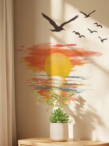 Detail of sunset beach wall sticker with black birds on a light beige textured wall