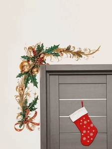 Close-up of festive Christmas holly wall decals with red berries and golden ornaments