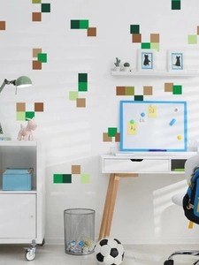 Détail de stickers muraux autocollants style pixel avec des carrés verts et marrons