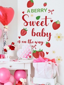 Baby shower party scene with Sweet Baby strawberry wall decals and pink balloons