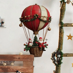 Christmas Santa Claus in a striped hot air balloon wall hanging decor with warm lights