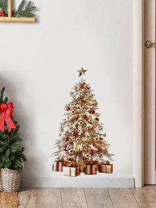 Detail of Christmas tree wall decal with gold ornaments and gift boxes for festive decor