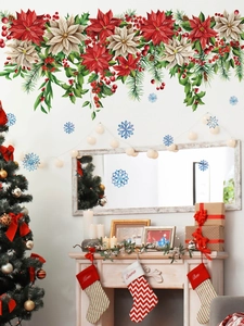 Christmas poinsettia wall decals and blue snowflakes above fireplace for holiday decoration