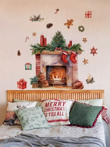 Macro detail of Christmas fireplace wall sticker set with festive socks and candles stickers