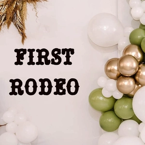 First Rodeo party balloon arch set with white green gold balloons and boho wall stickers