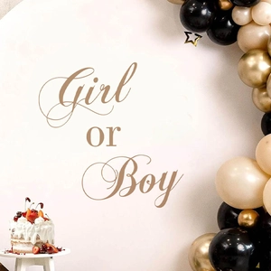 Gender reveal backdrop with gold Girl or Boy text and black gold balloon arch decor