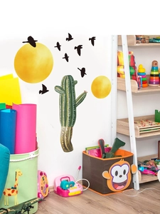 Nursery wall sticker showing watercolor cactus, birds and sun decals in a playroom