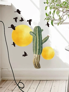 Detail showing green cactus with white thorns and black bird silhouettes wall decals