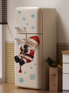 Macro detail of 3D Santa Claus wall sticker with blue snowflakes on a fridge surface