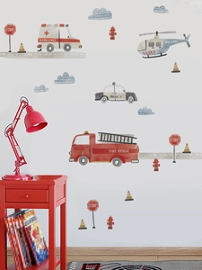 Detail of watercolor cartoon wall stickers featuring rescue vehicles in a nursery