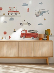 Hand-painted watercolor emergency vehicle wall stickers on a clean nursery wall
