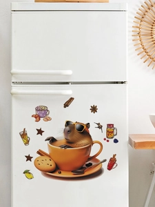 Detail of cute Capybara coffee cup wall sticker applied on white refrigerator surface