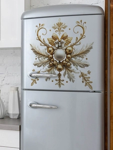 Detail view of gold and silver Christmas snowflake wall stickers on a silver refrigerator surface