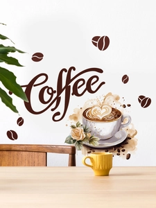 Detail of coffee wall decals showing artistic lettering and coffee beans on a white wall