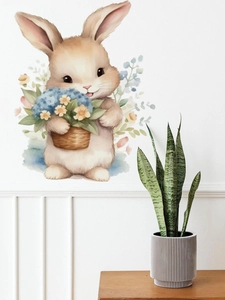 Detail von Aquarell Hase Wandtattoo mit Blumenkorb an einer weißen Wand