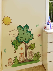 Detail view of cartoon sun, tree, and animals wall sticker set for kid nursery decor