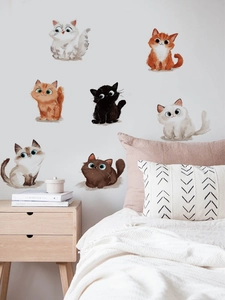 Detail of 7 cute cartoon cat wall stickers in a cozy bedroom scene for home decor