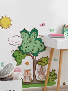 Cartoon wall stickers featuring sun, trees and animals in a kids bedroom setting