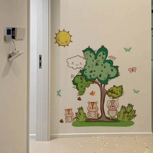 Cartoon animal wall stickers featuring a large tree and sun for kids room decor