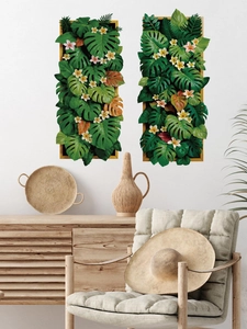 Decorazione da parete con piante tropicali, foglie di monstera e fiori di frangipani
