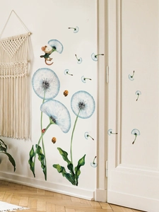 Detail view of blue dandelion wall decals with cute mouse and insects in a cozy room