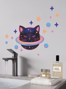 Detail view of cat planet wall sticker with stars applied on a modern gray bathroom wall