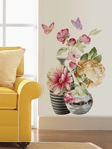 Detail of floral wall stickers with vases and butterflies for living room decoration