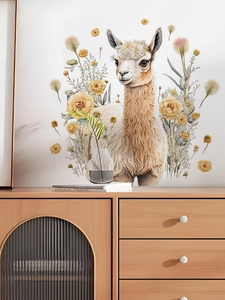 Detail showing the alpaca wall decal with yellow flowers applied to a living room wall