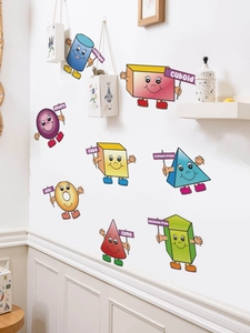 Detailed view of 3D anthropomorphic geometric wall stickers on a white interior wall
