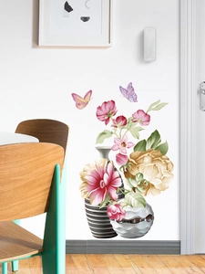 Detail of floral wall decals featuring pink flowers, butterflies and striped art vases