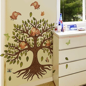 Adhesive PVC wall decal featuring a brown tree with colorful owls and butterflies