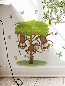 Jungle theme wall sticker with monkeys and butterflies on a tree for kids room decor