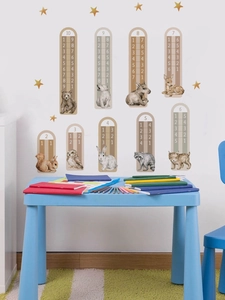 Detail of Nordic animal addition wall stickers showing educational numbers on a white wall